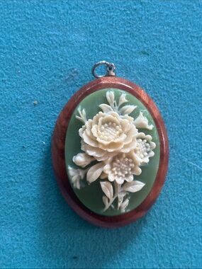 Unique vintage carved cameo in wood floral pendant